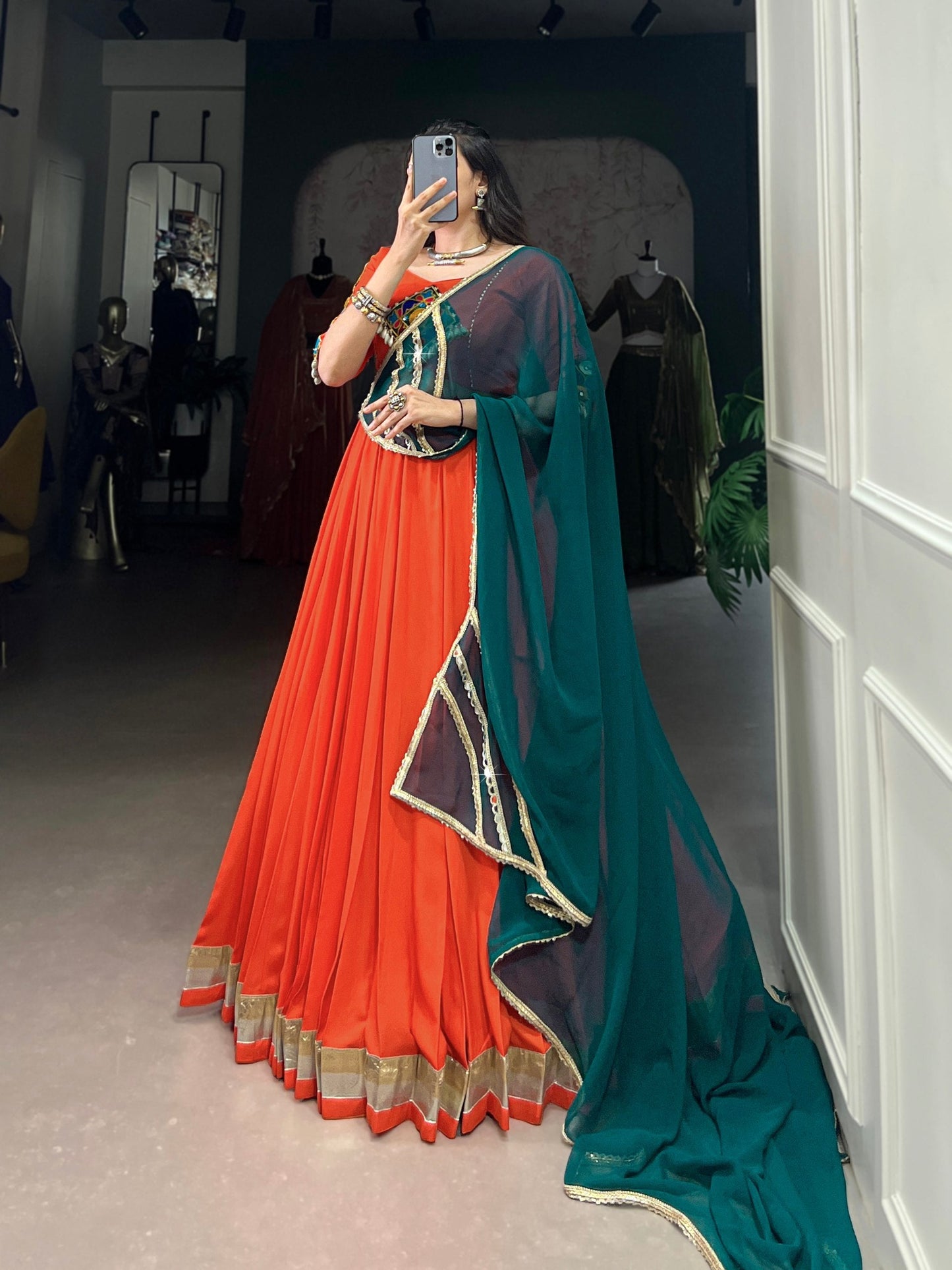 Magnificent Orange Pure Rayon Embossed Navratri Lehenga Choli
