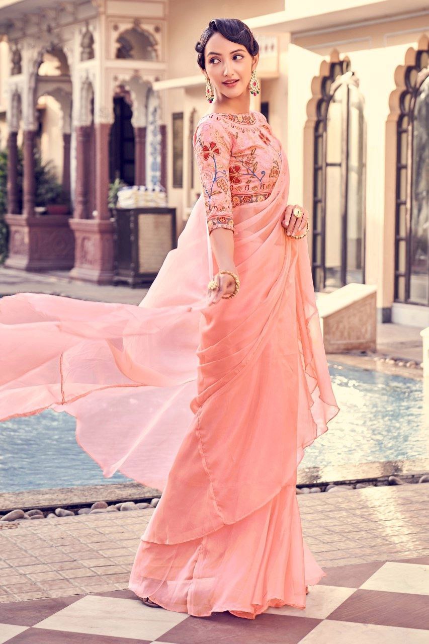 Graceful Peach Pink Organza Saree With Elegant Embroidery Work