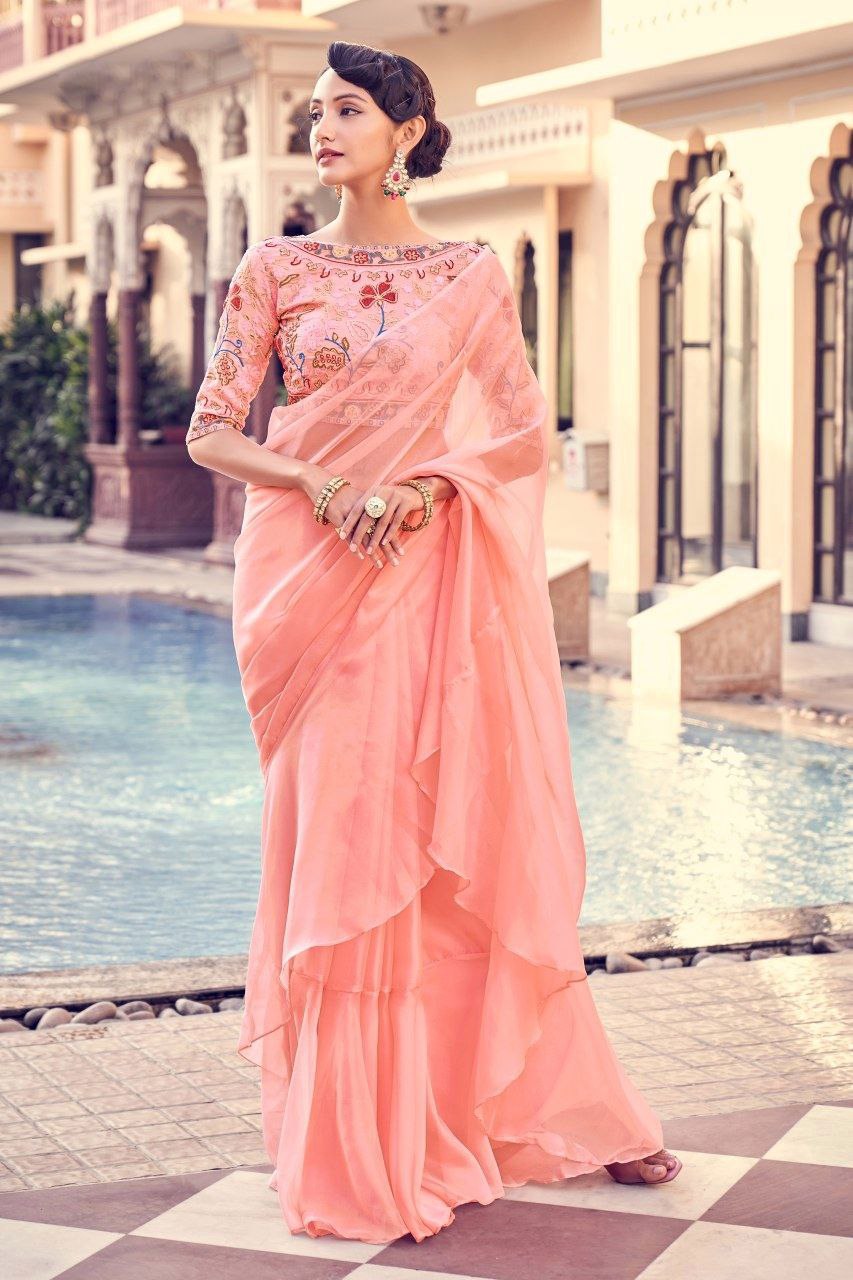 Graceful Peach Pink Organza Saree With Elegant Embroidery Work