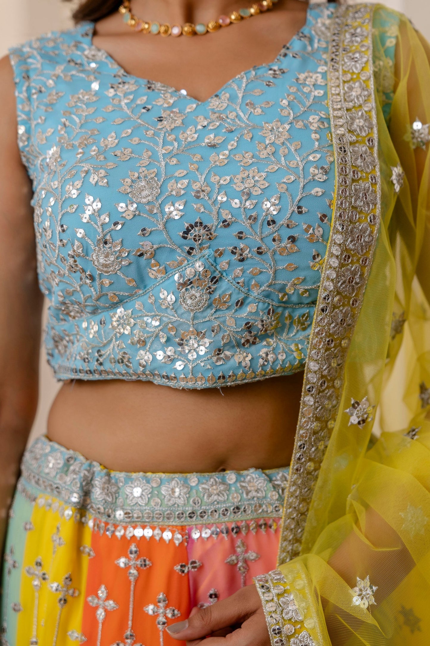 Multicolored Faux Georgette Sequins Thread Embroidered Lehenga Choli