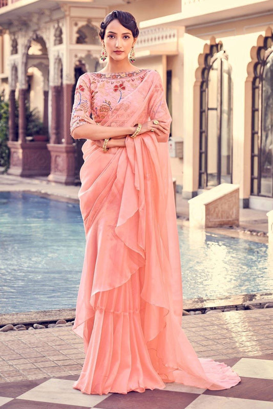 Graceful Peach Pink Organza Saree With Elegant Embroidery Work